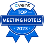 Blue badge with text 'Top Meeting Hotels 2023'. Award logo features 'cvent' at top